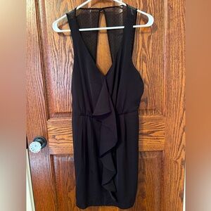 Black mini v-neck dress with flirty ruffle, size 6 by BCBGeneration